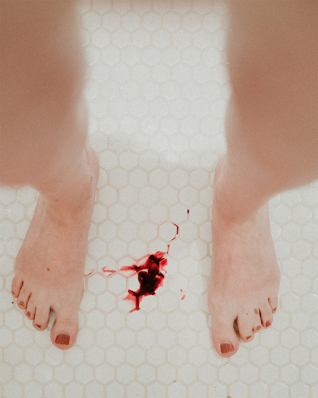 menstrual blood on bathroom floor